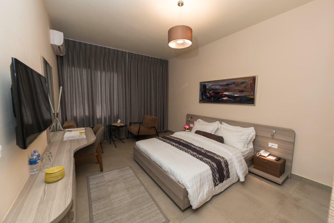 Roots Hotel Apartments Abidjan Exterior photo